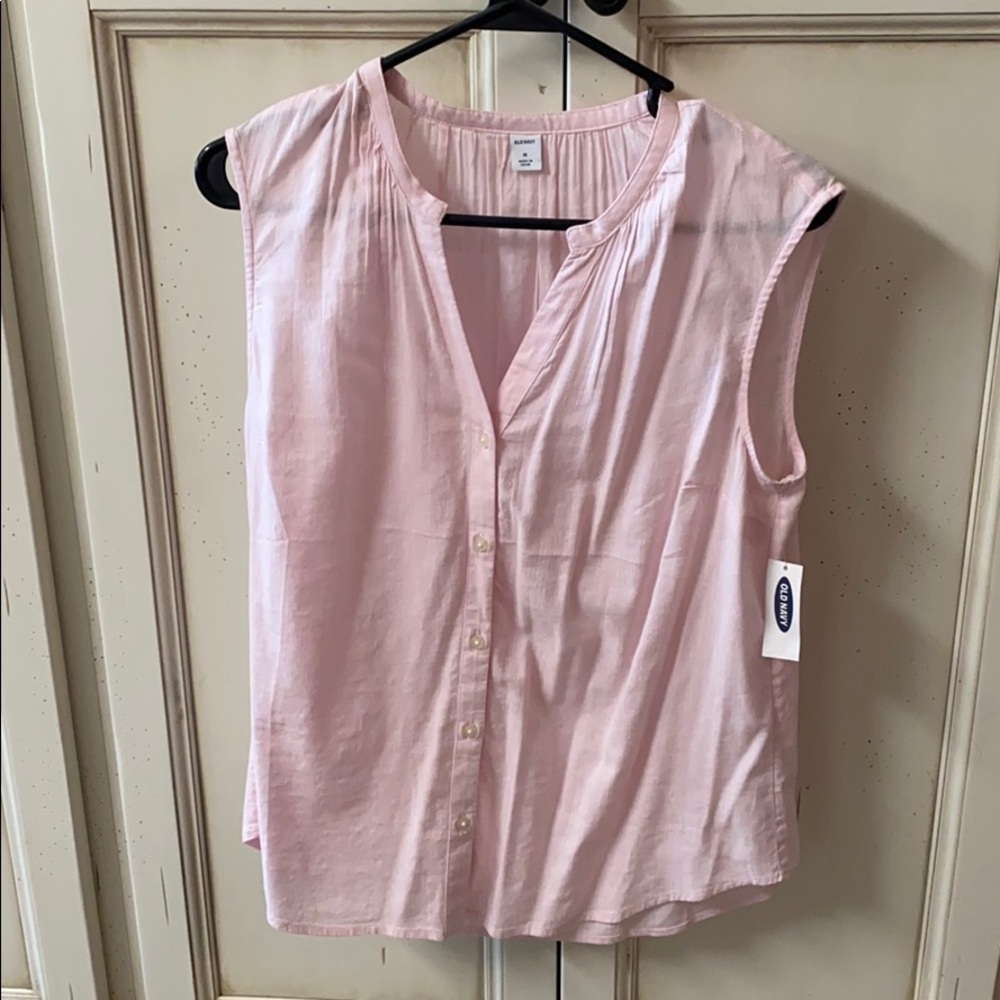 Pink sleeveless blouse